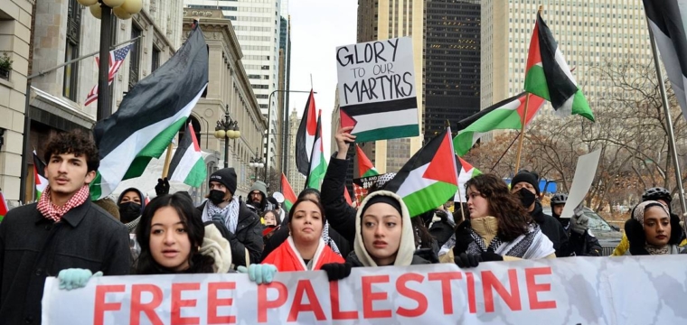 CHICAGO, ILLINOIS, USA - JANUARY 29: People march during a protest organized by Chicago Coalition for Justice in Palestine against the killing of 9 people in the Jenin refugee camp during an Israeli military operation as police take security measures on January 29, 202, in Chicago, Illinois, United States. On January 26th Israeli forces killed 9 Palestinians and wounded 20 in a raid on Jenin Refugee Camp of West Bank. ( Jacek Boczarski - Anadolu Agency )